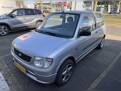 Daihatsu Cuore - 1.0-12V DVVT STi
