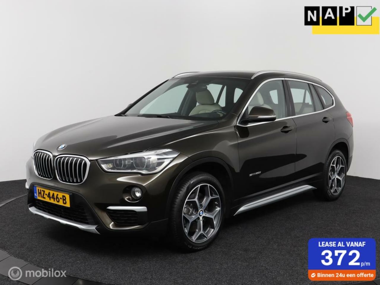 BMW X1 - SDrive 2.0i 192Pk Aut-8 | Clima | Leder | Cruise | Head-up display | Stoelverw. | Xenon | - AutoWereld.nl