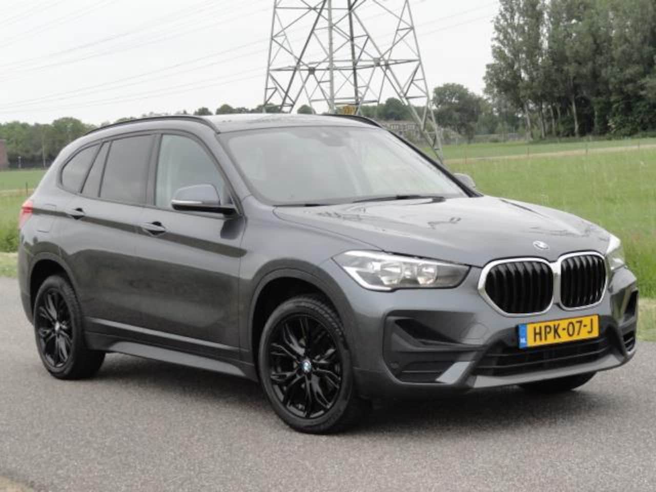 BMW X1 - SDrive18i High Executive Full LED+NAVIG+PDC - AutoWereld.nl