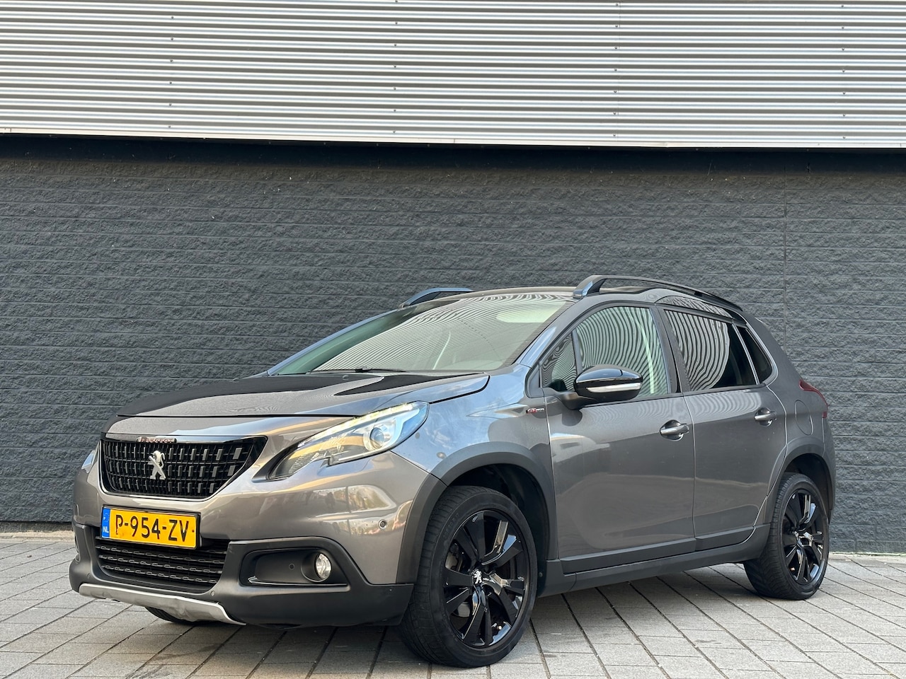 Peugeot 2008 - 1.2 GT-line/Leer/Led/Xenon/Mode/Sport onderstel/Sport stoelen/Full option - AutoWereld.nl