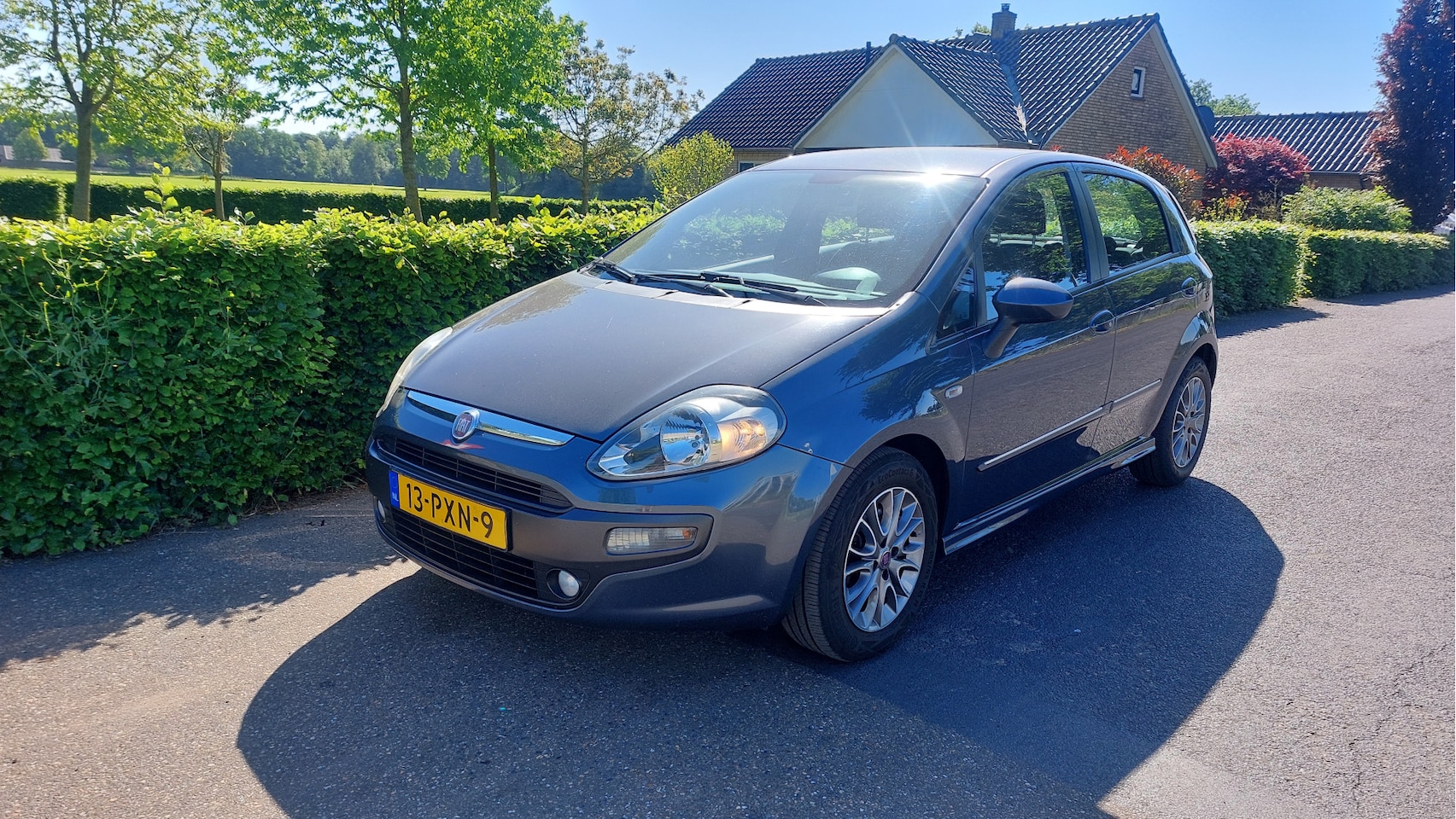 Fiat Punto Evo - 1.3 M-Jet Dynamic CLIMA BJ 2011 - AutoWereld.nl