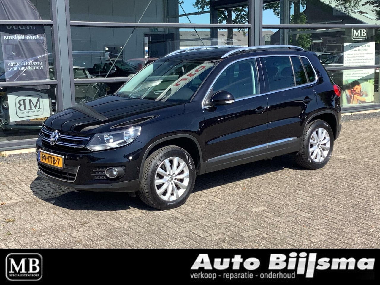 Volkswagen Tiguan - 1.4 TSI Comfort&Design, cruise, navi, trekhaak, nette auto - AutoWereld.nl