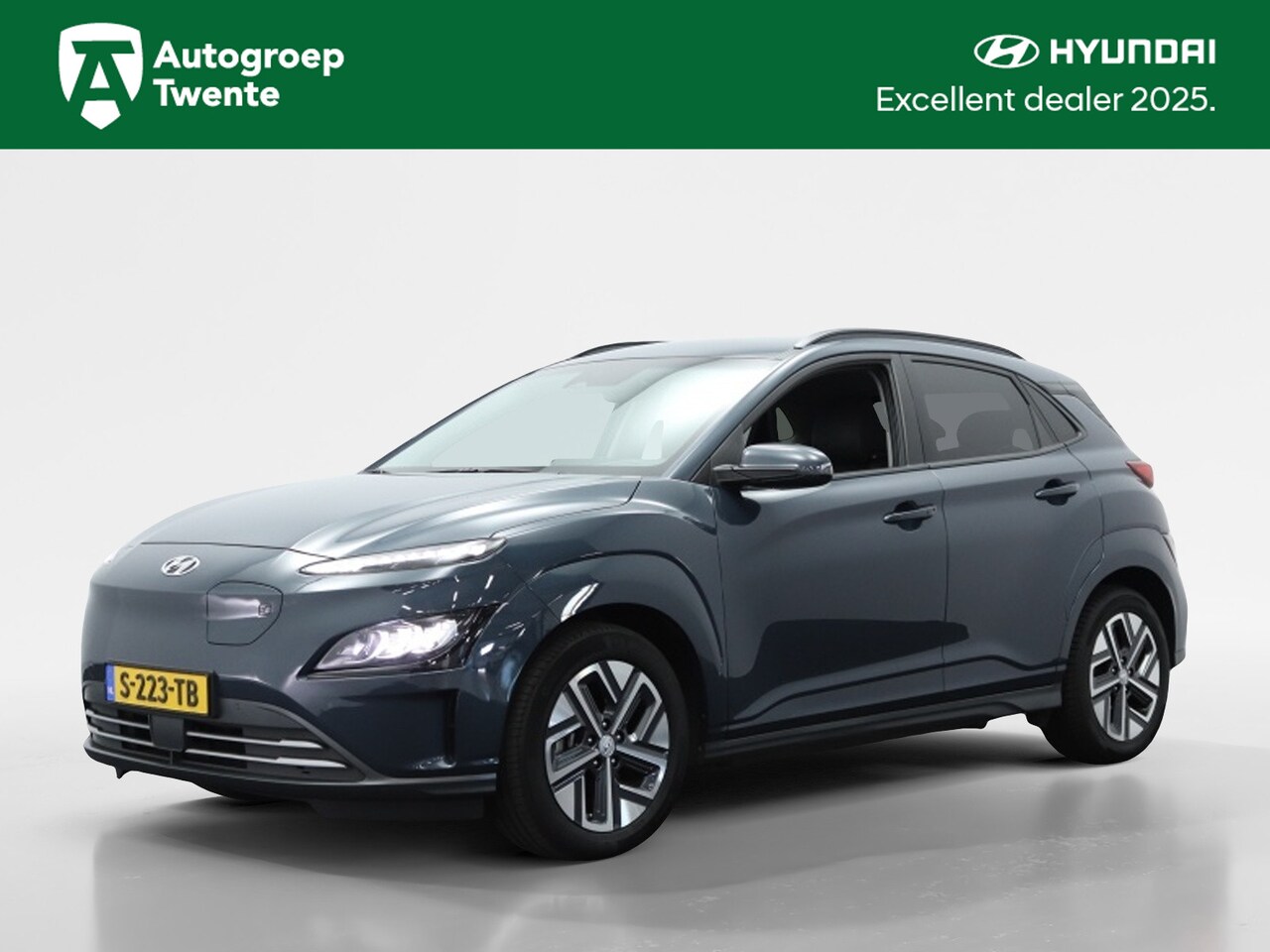 Hyundai Kona Electric - EV Premium 64 kWh | Leder | Navigatie | Apple carplay | Camera - AutoWereld.nl