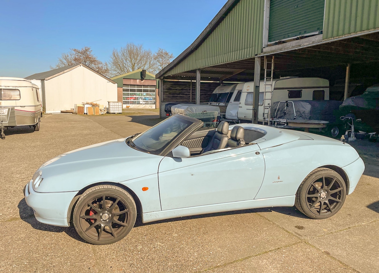Alfa Romeo Spider - 1.8-16V T.Spark type 916 phase 2 Lichtblauw (Alfa 156 kleur) Leren sportstoelen - AutoWereld.nl