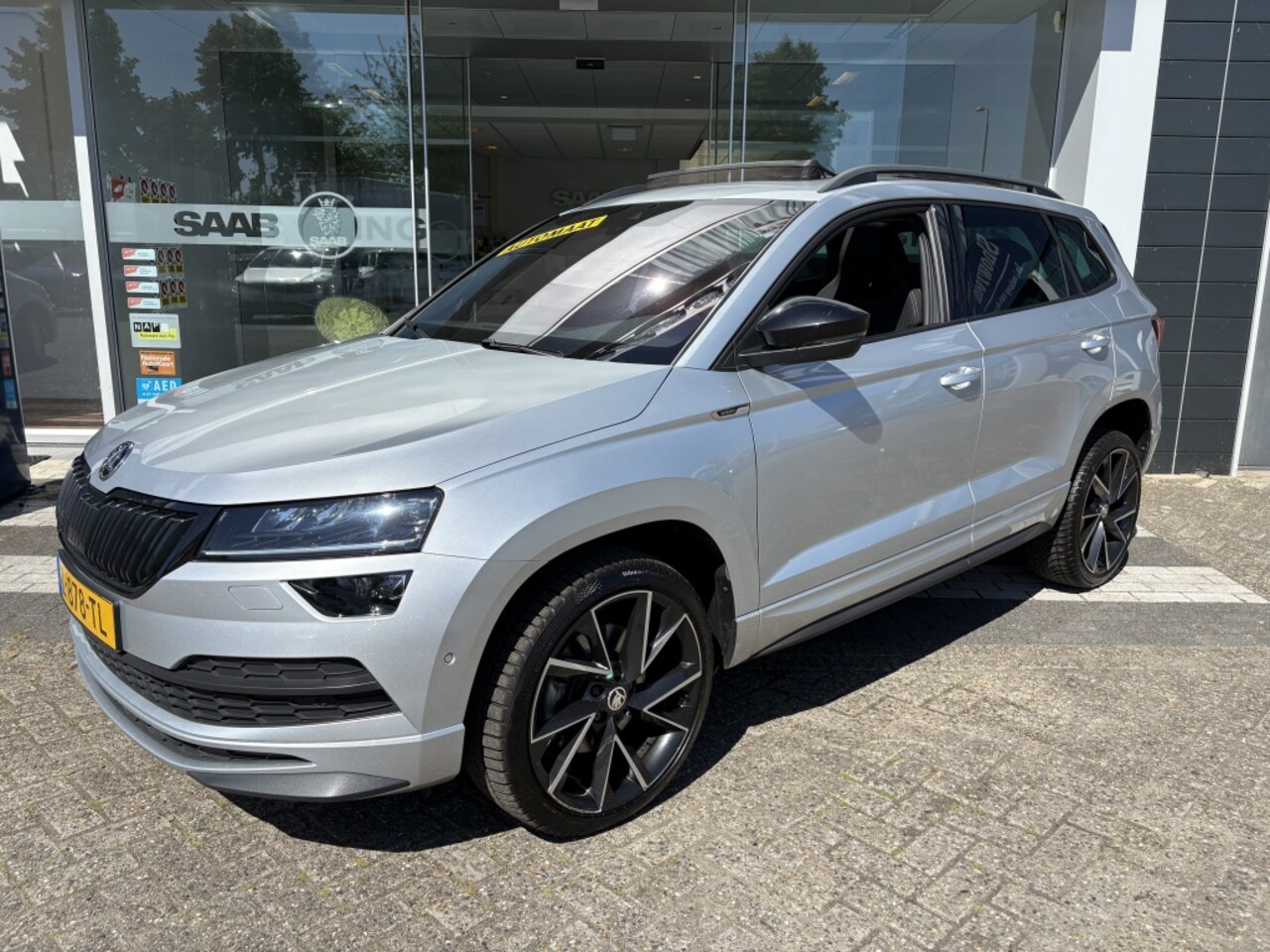 Skoda Karoq - 1.5 TSI Sportline Trekhaak/Schuifdak/Cruise Control/Virtual - AutoWereld.nl