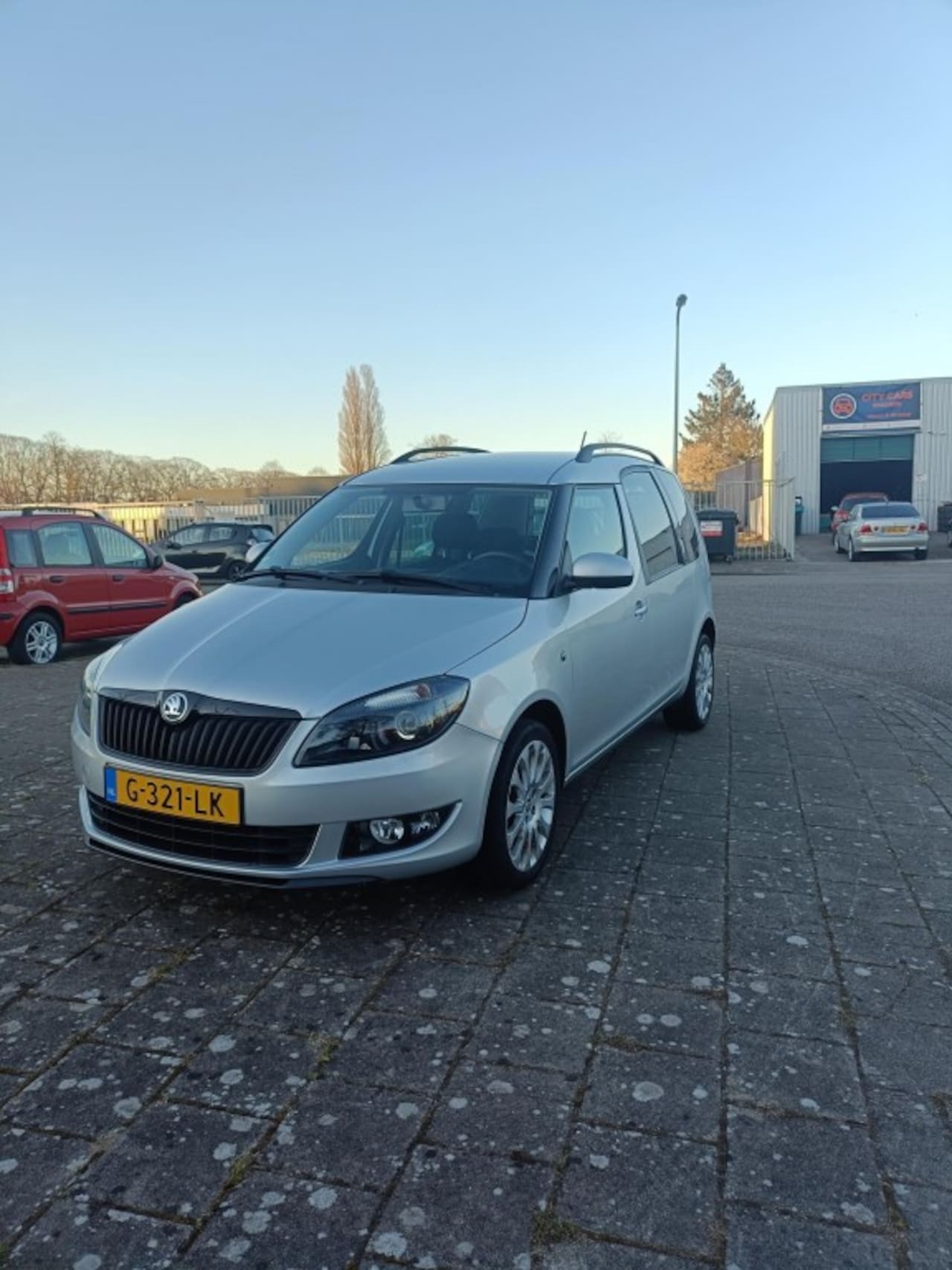 Skoda Roomster - 1.2 TSI Drive 1.2 TSI DRIVE - AutoWereld.nl
