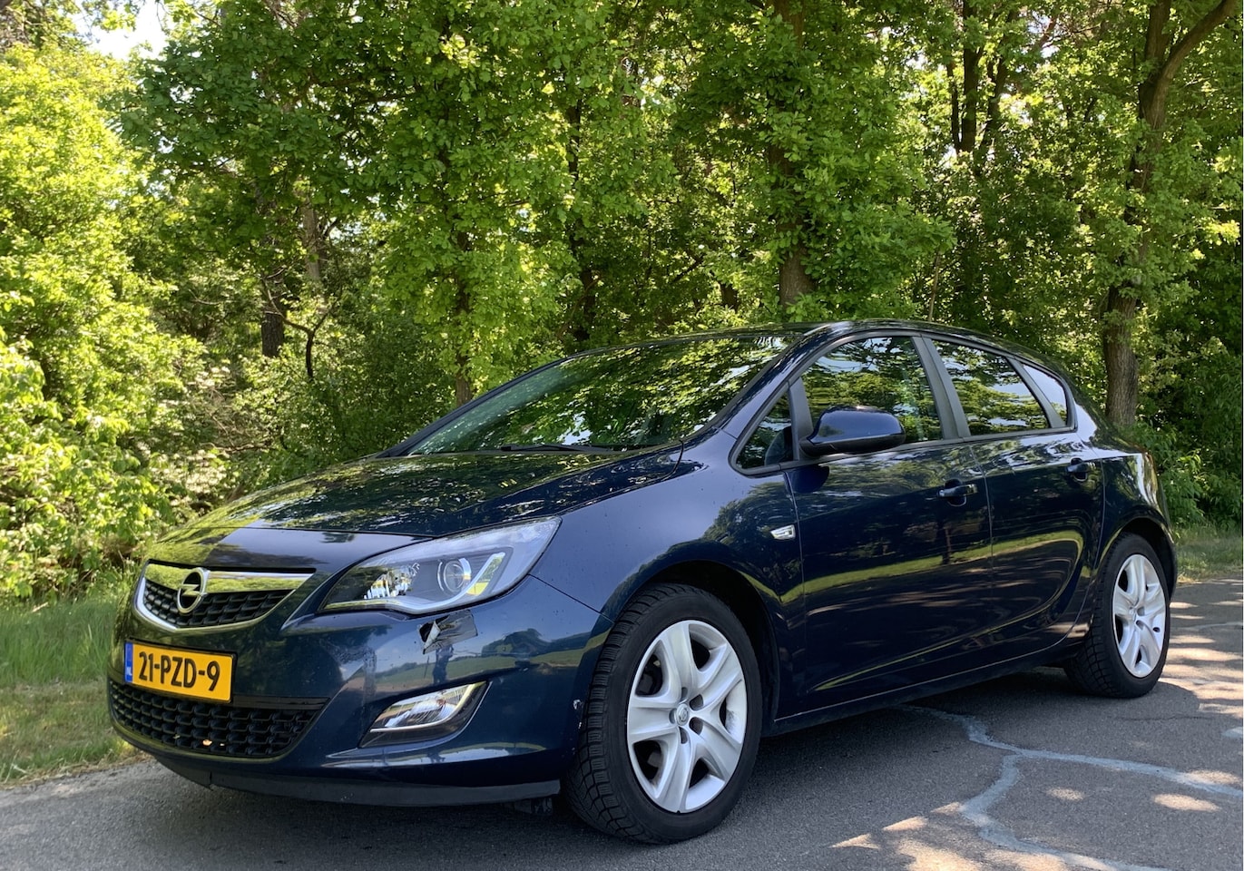 Opel Astra - 1.4 Edition 1.4 Edition, Xenon, Sportstoelen, Navigatie, Trekhaak, PDC, Airco, Cruise control. - AutoWereld.nl