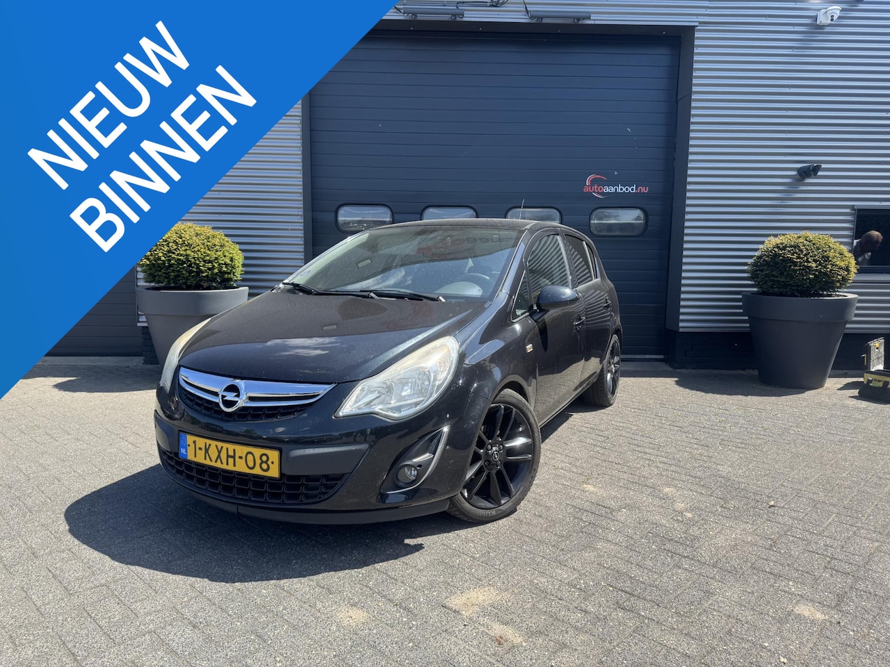 Opel Corsa - 1.2-16V Anniversary Edition | Airco | Trekhaak | Cruise control | Lichtmetalen velgen | 5 - AutoWereld.nl