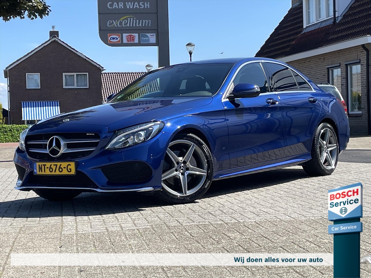 Mercedes-Benz C-klasse - C180 AMG Sport / Org NL / Leder / Camera / Trekhaak / Navi / Stoelverwarming / Elektr stoe - AutoWereld.nl