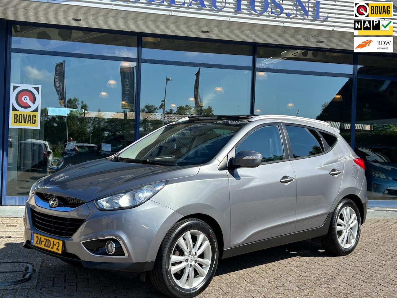 Hyundai ix35 - 2.0i i-Catcher Aut. Elek.Panorama Leer Navi Clima Cruise Camera Dealeronderhouden! - AutoWereld.nl