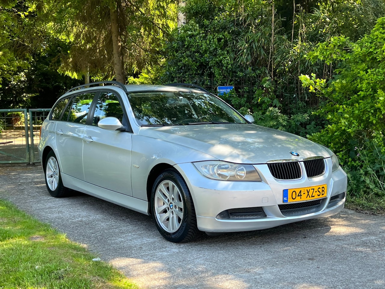 BMW 3-serie Touring - 318i Business Line | Cruise + Clima + Navi - AutoWereld.nl