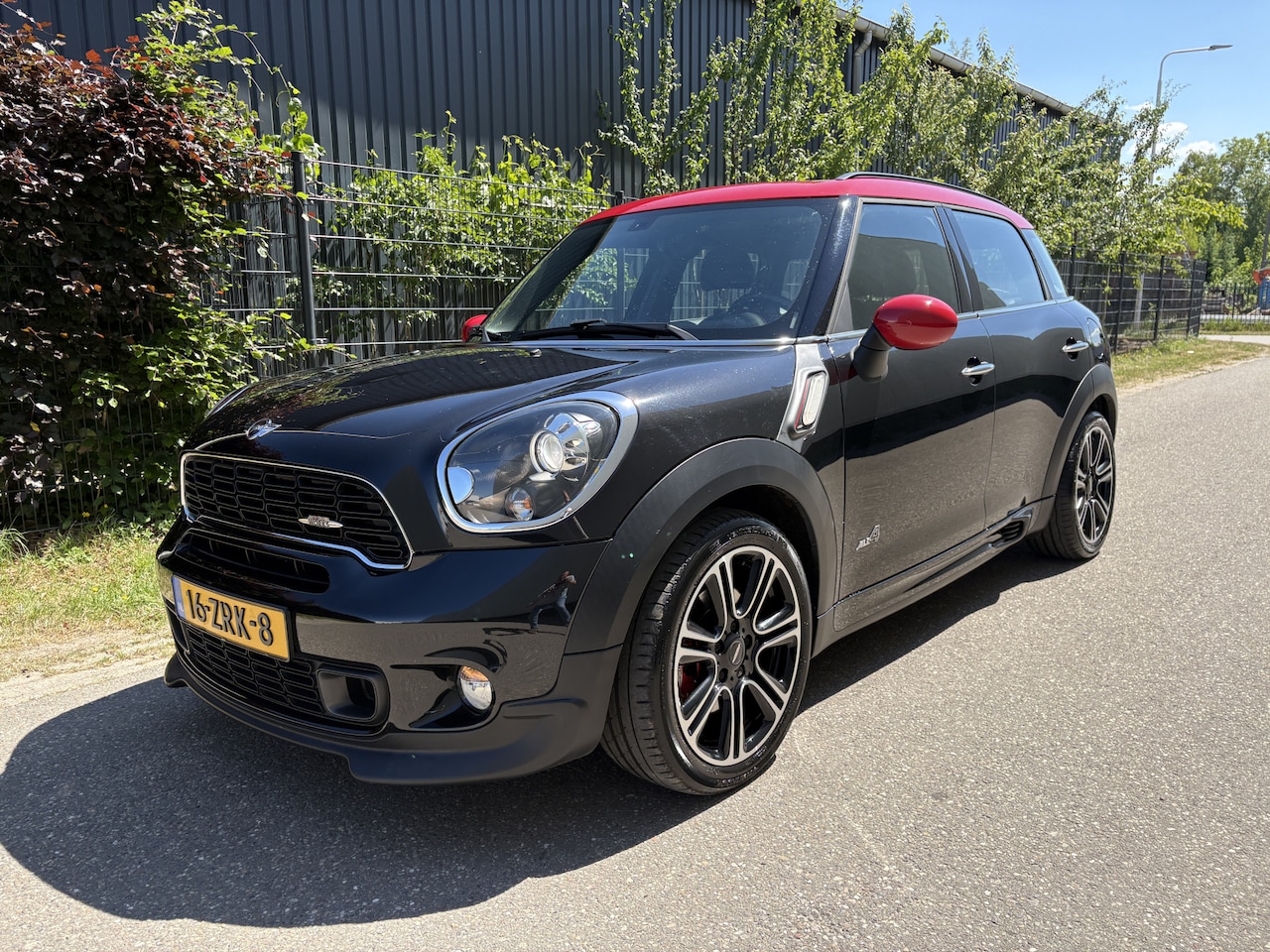 MINI Countryman - Mini 1.6 John Cooper Works ALL4 Chili / AUTOMAAT / JCW / PANORAMADAK / 97dkm! NAP! - AutoWereld.nl