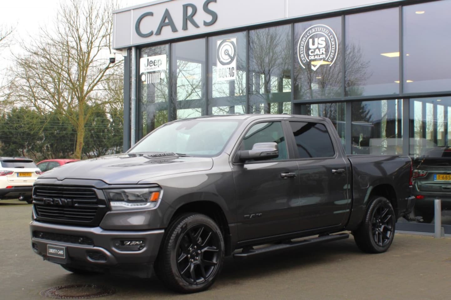 Dodge Ram - NIEUW BPM VRIJ 5.7i V8 Hemi Sport Black Ed. 12 inch Scherm / Pan - AutoWereld.nl