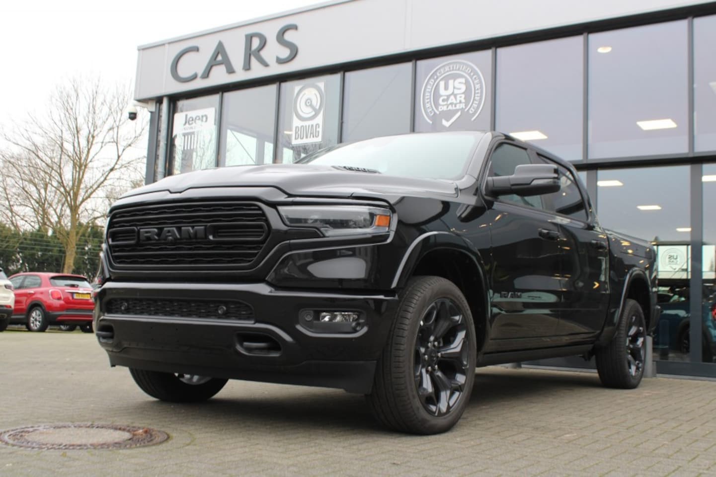 Dodge Ram - NIEUW BPM VRIJ 5.7i V8 Hemi LIMITED Night Edition LUCHTVERING - AutoWereld.nl