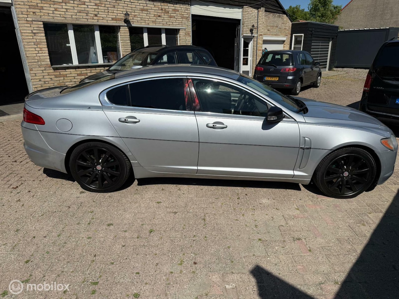 Jaguar XF - 2.7D V6 Luxury 2.7D V6 Luxury - AutoWereld.nl