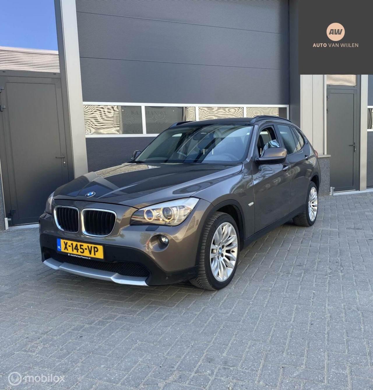 BMW X1 - sDrive18i Executive AUT/STOELVERW/TrekH - AutoWereld.nl