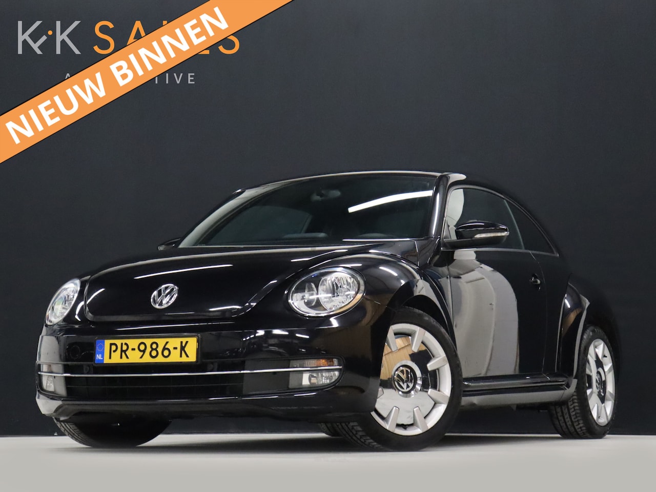 Volkswagen Beetle - 1.2 TSI Design [APPLE CARPLAY, CRUISE CONTROL, STOELVERWARMING, PDC V+A, VOL LEDER, CLIMAT - AutoWereld.nl