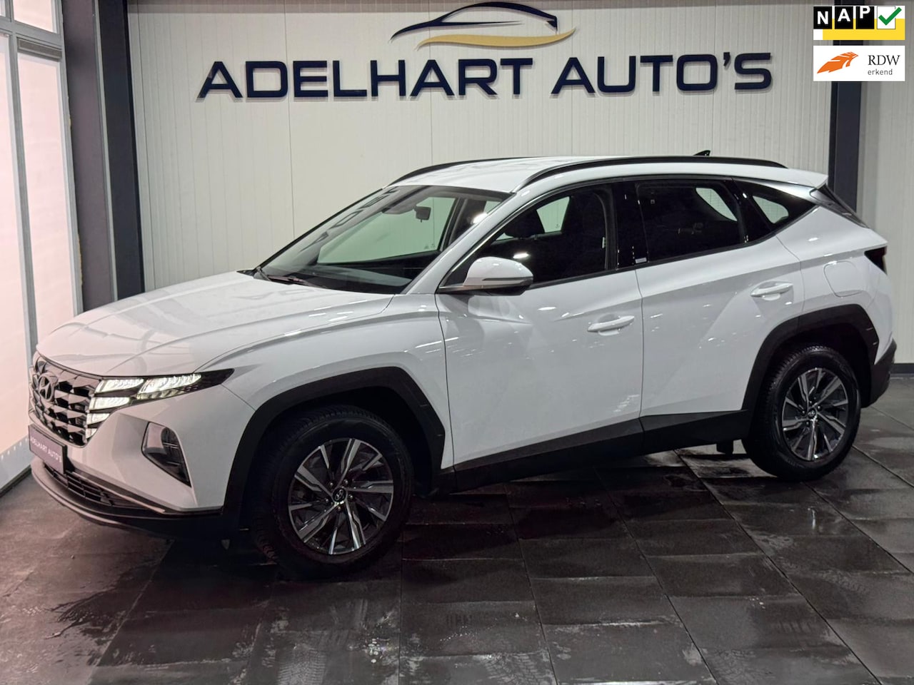 Hyundai Tucson - 1.6 T-GDI MHEV Comfort Automaat / Navigatie full map / Cruise control / Camera / Climate c - AutoWereld.nl