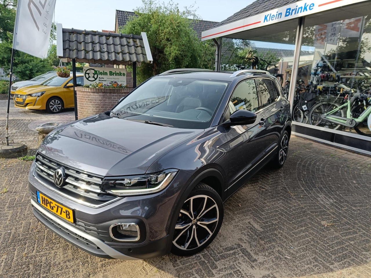 Volkswagen T-Cross - 1.0 TSI Style Automaat /Originele afneembare trekhaak / Camera/ Nieuwstaat!! - AutoWereld.nl