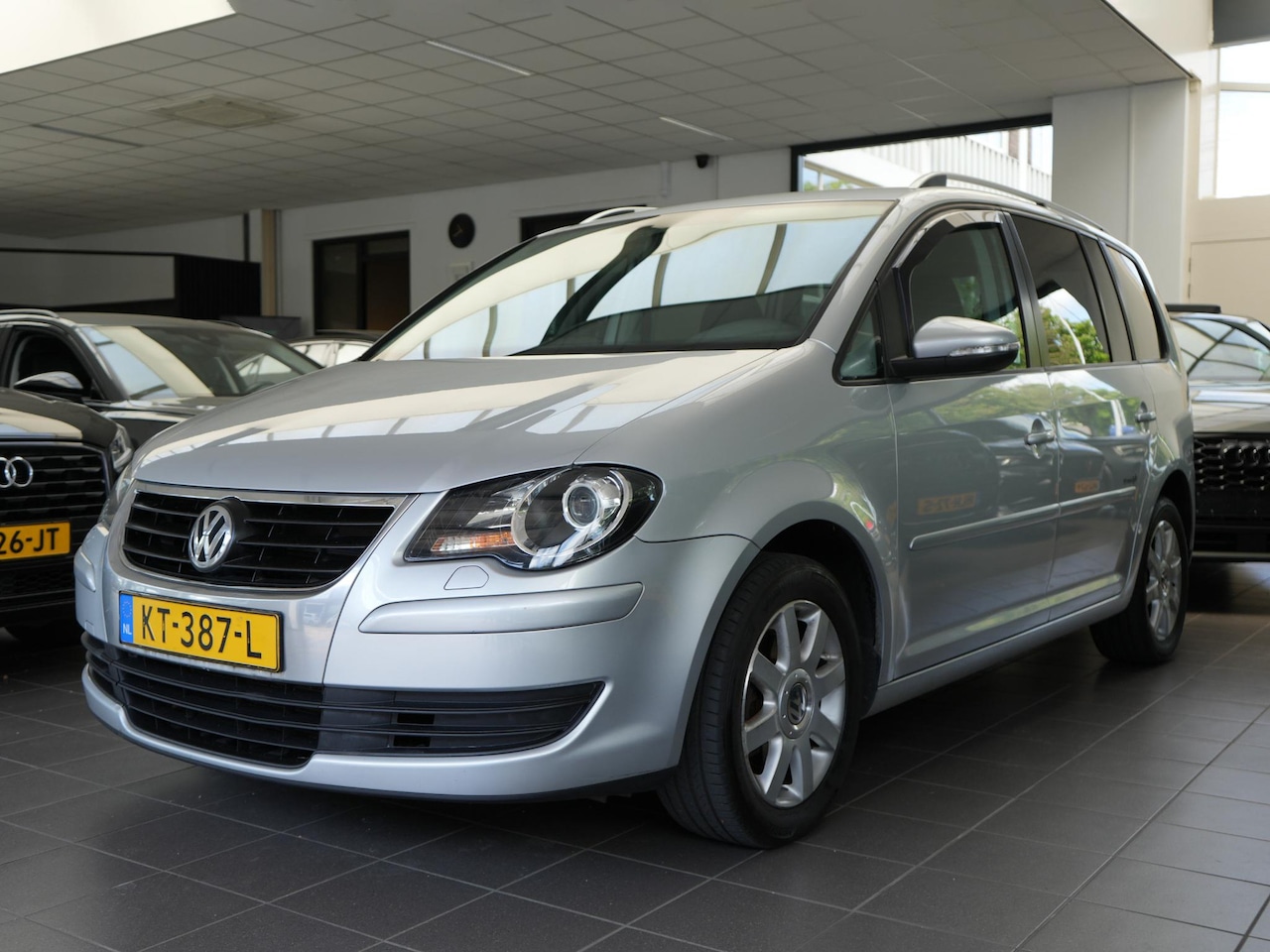 Volkswagen Touran - 1.4 TSI Highline | 7-ZITS | NAVI | TREKHAAK | CLIMA - AutoWereld.nl