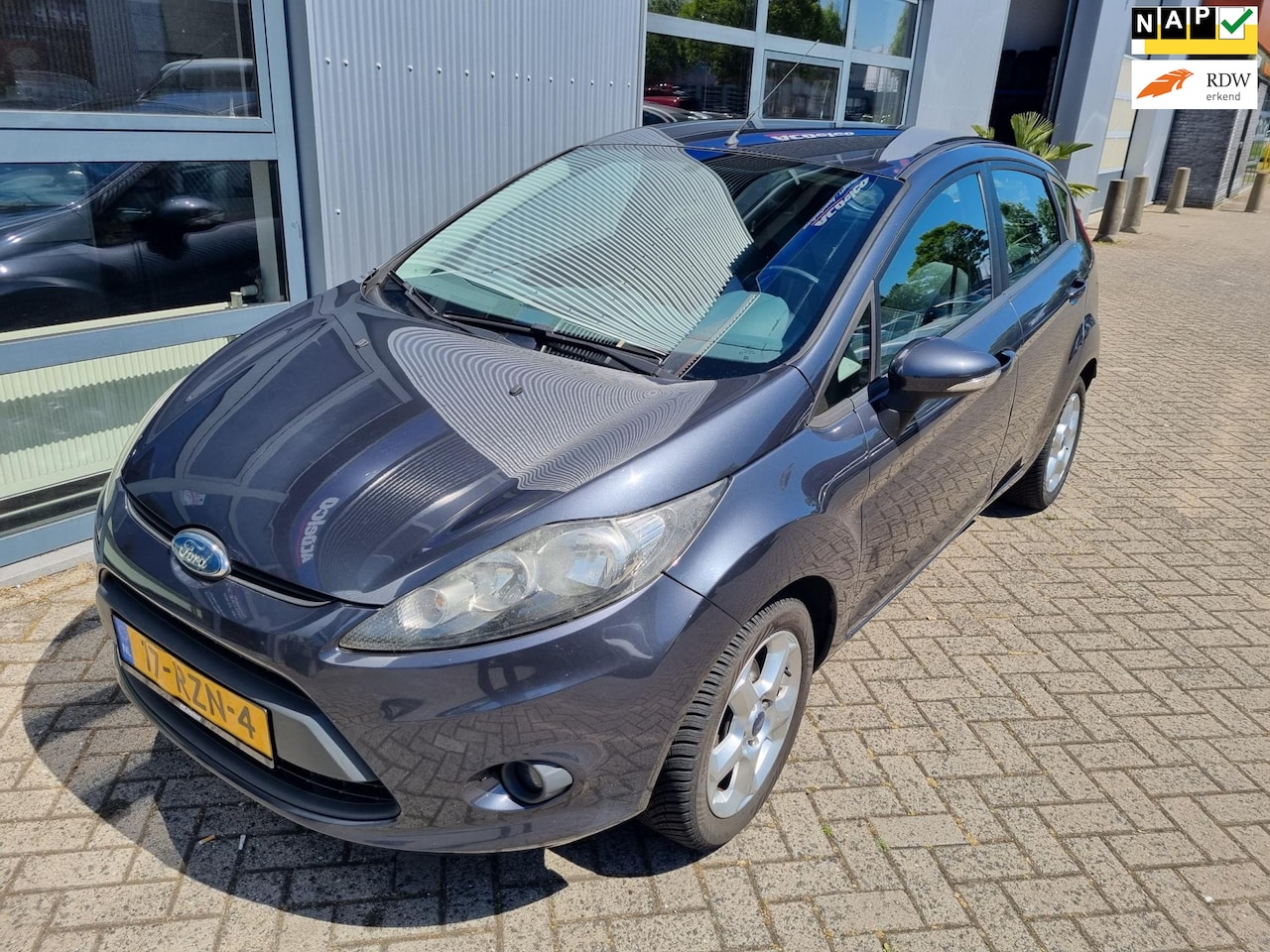 Ford Fiesta - 1.4 Ghia / airco / incl. nieuwe apk en beurt - AutoWereld.nl