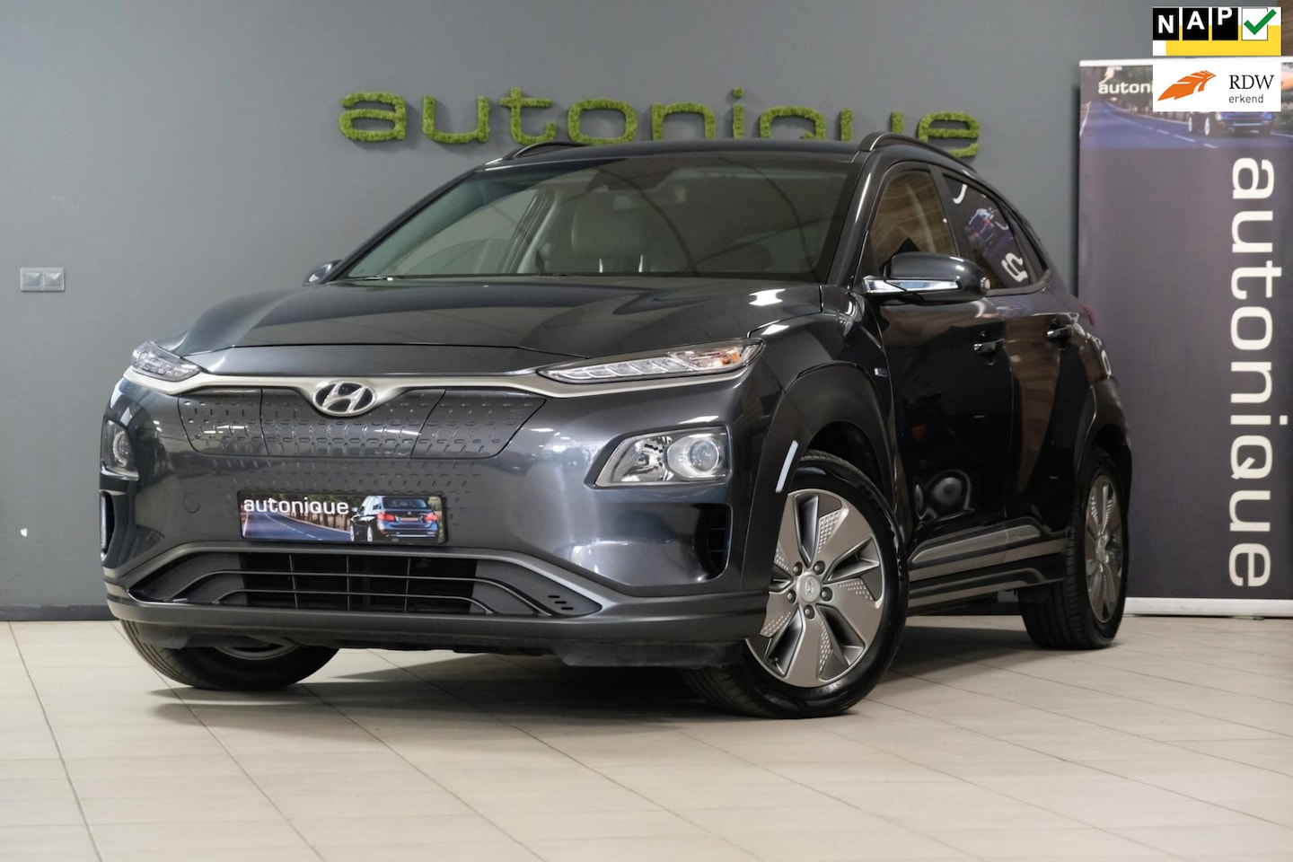 Hyundai Kona Electric - EV Comfort 39 kWh *Achteruitrijcamera* |39.486km| Nieuwstaat Auto! - AutoWereld.nl
