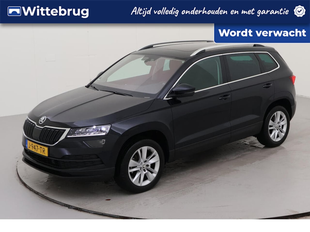 Skoda Karoq - 1.5 TSI ACT Business Edition Plus / Metallic/ Led/ Camera/ Panoramadak/ Clima/ Navi/ Parke - AutoWereld.nl