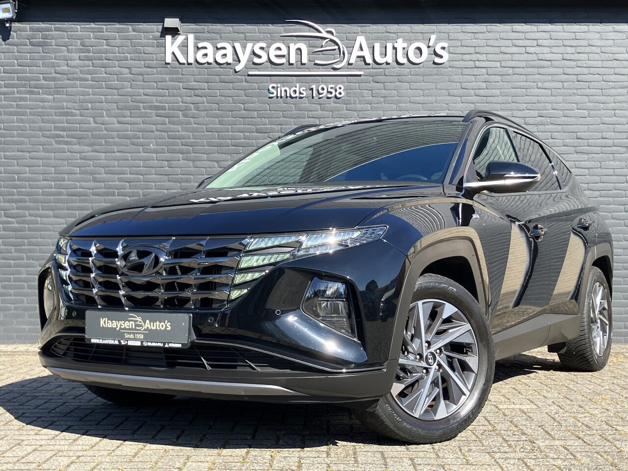 Hyundai Tucson - 1.6 T-GDI MHEV 230 pk Premium AUT. | 1e eigenaar | navigatie | leder interieur | krell aud - AutoWereld.nl