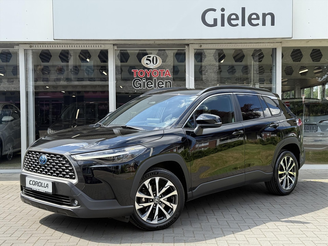 Toyota Corolla Cross - 2.0 High Power Hybrid First Edition | Elektrische achterklep, Stoel + Stuurverwarming, Bli - AutoWereld.nl