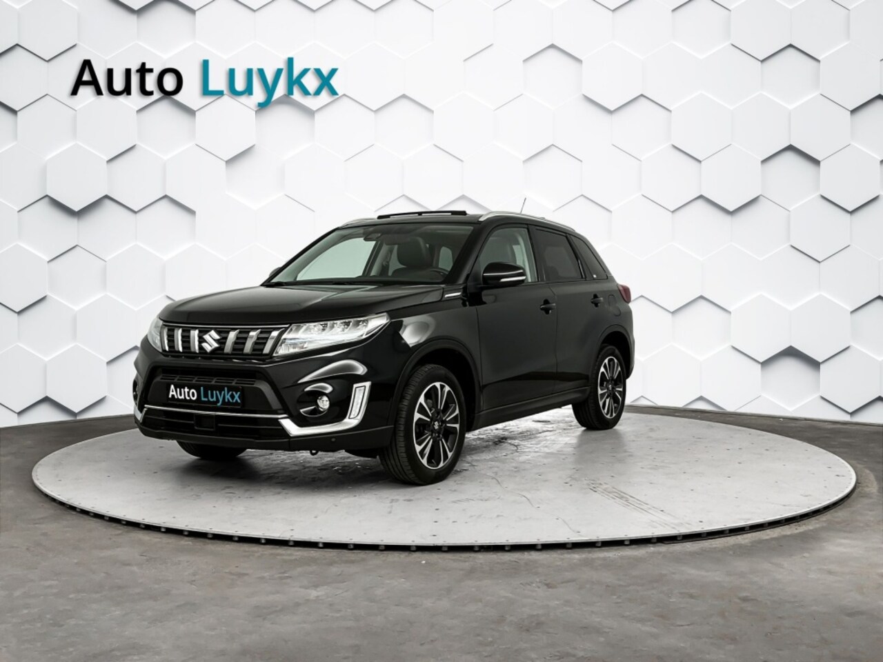 Suzuki Vitara - 1.5 Hybrid Style Allgrip Automaat | Panoramadak | Adaptieve Cruise Control | Parkeercamera - AutoWereld.nl
