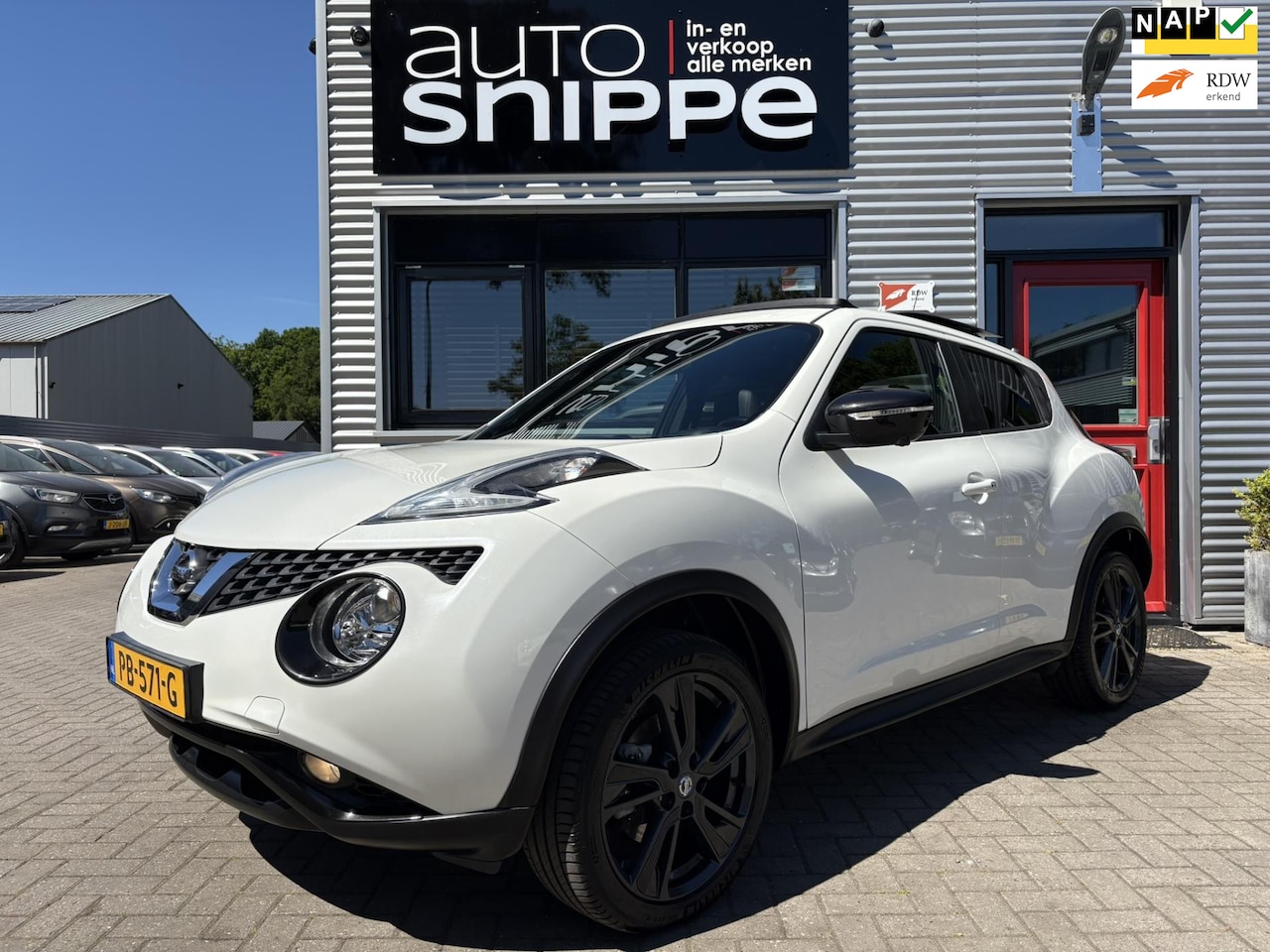 Nissan Juke - 1.6 DIG-T Tekna -190 PK-VOLLEDER-OPEN DAK-360 CAMERA-PARELMOER WIT-KEYLESS-ORIGINEEL NEDER - AutoWereld.nl