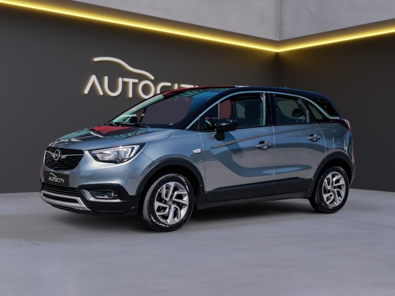 Opel Crossland X - 1.2 T. Online Edition Airco l Navi - AutoWereld.nl