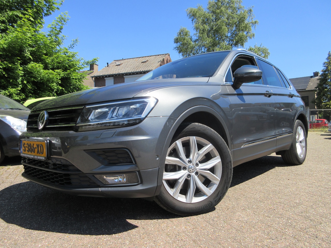 Volkswagen Tiguan - 2.0 TSI 4Motion Highline Business R 100dkm / SUV / - AutoWereld.nl