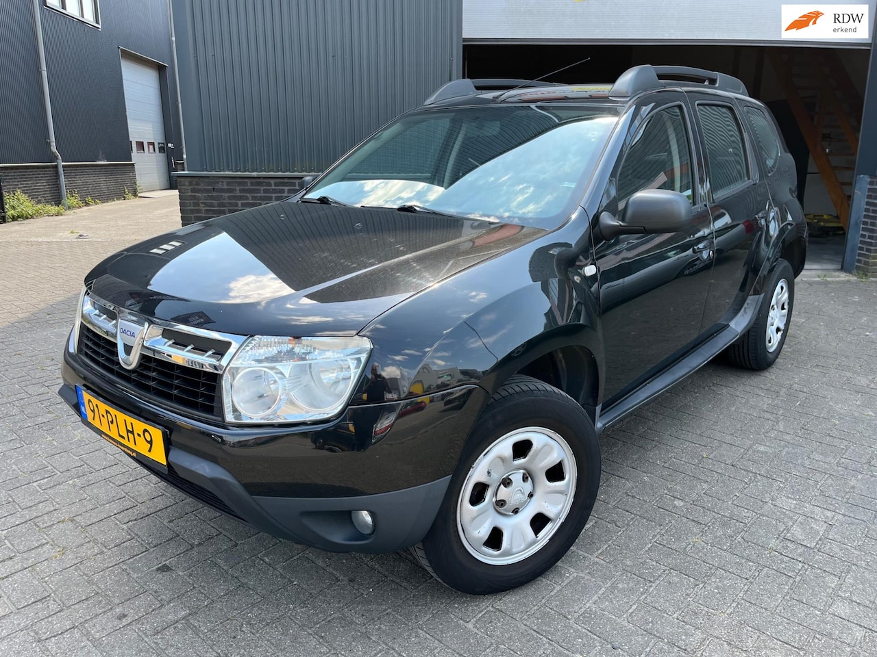 Dacia Duster - 1.6 Lauréate 2wd airco - AutoWereld.nl