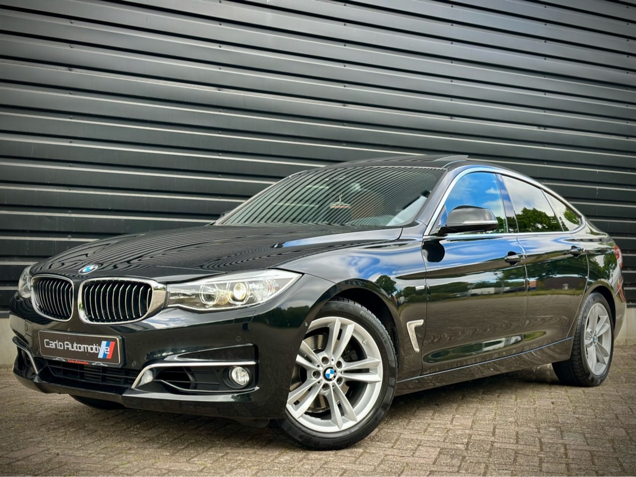 BMW 3-serie Gran Turismo - 328i LUXURY PANO|HEADUP|360CAM|BLINDSPOT - AutoWereld.nl