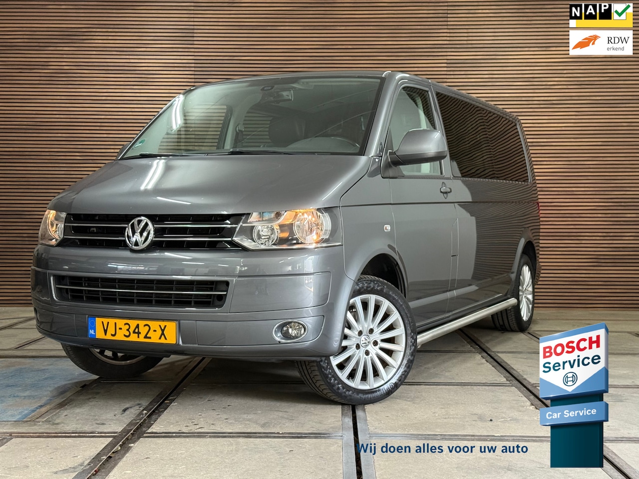 Volkswagen Transporter - 2.0 TDI L2H1 DC Automaat | Leer | Navigatie | Sidebars - AutoWereld.nl