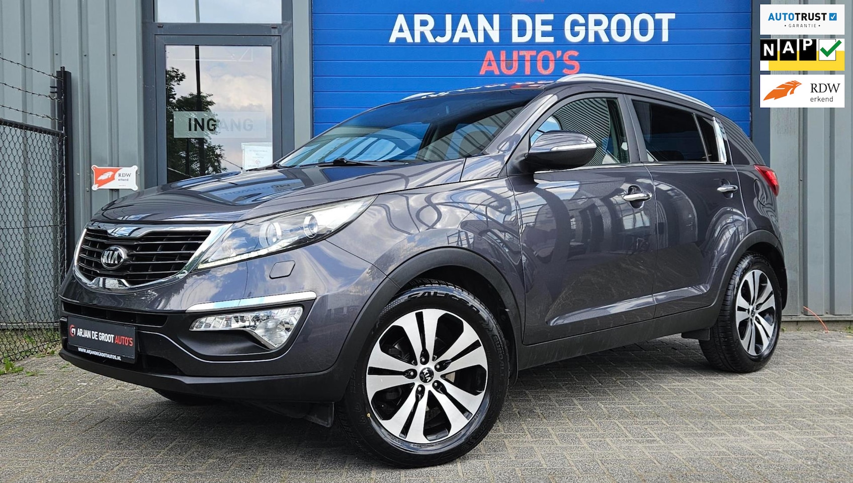 Kia Sportage - 2.0 Super Pack 163PK AUTOMAAT Navi Cruise Camera Clima - AutoWereld.nl