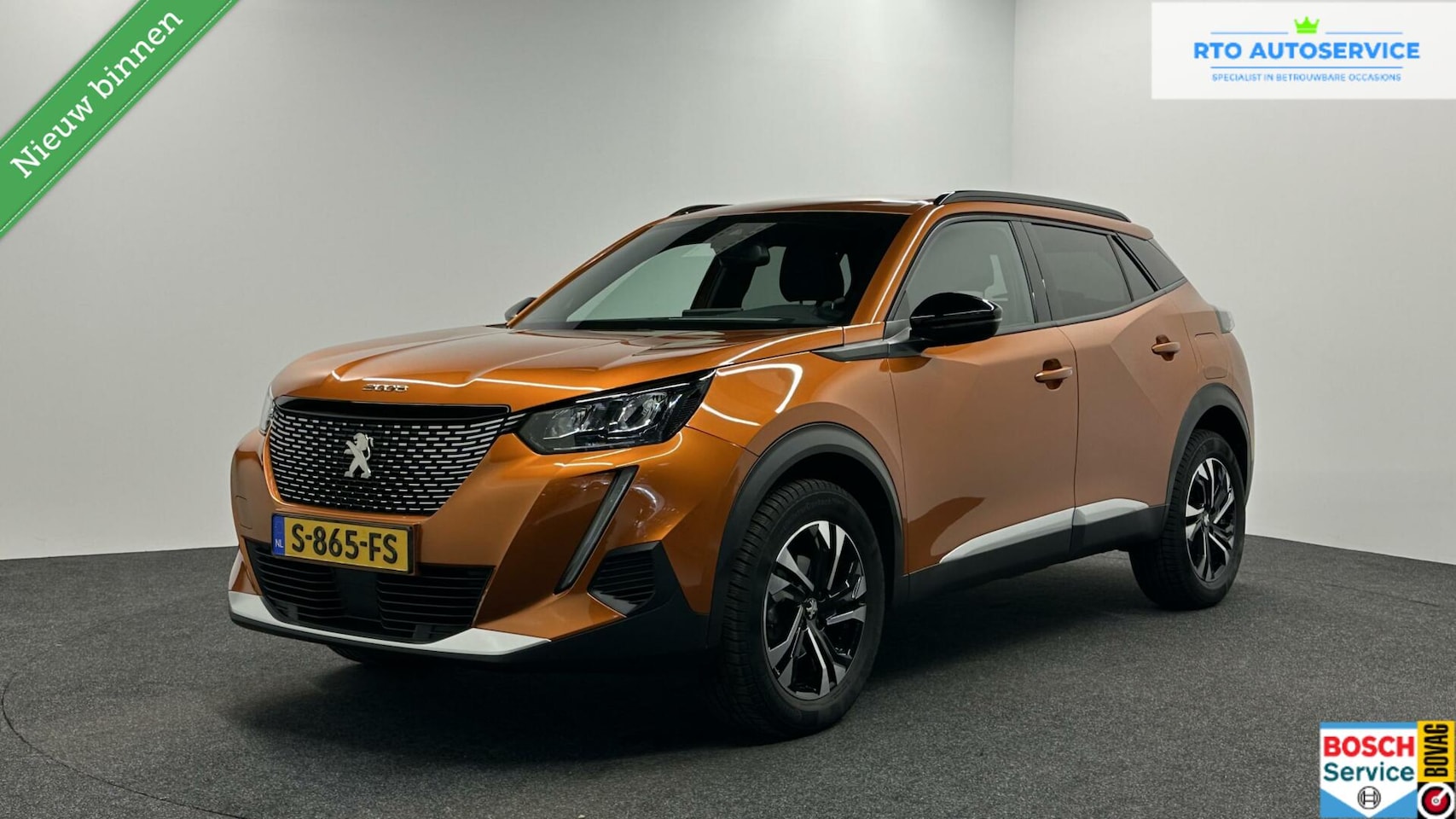 Peugeot 2008 - 1.2 PureTech Allure Pack CAMERA NAVI TREKHAAK - AutoWereld.nl