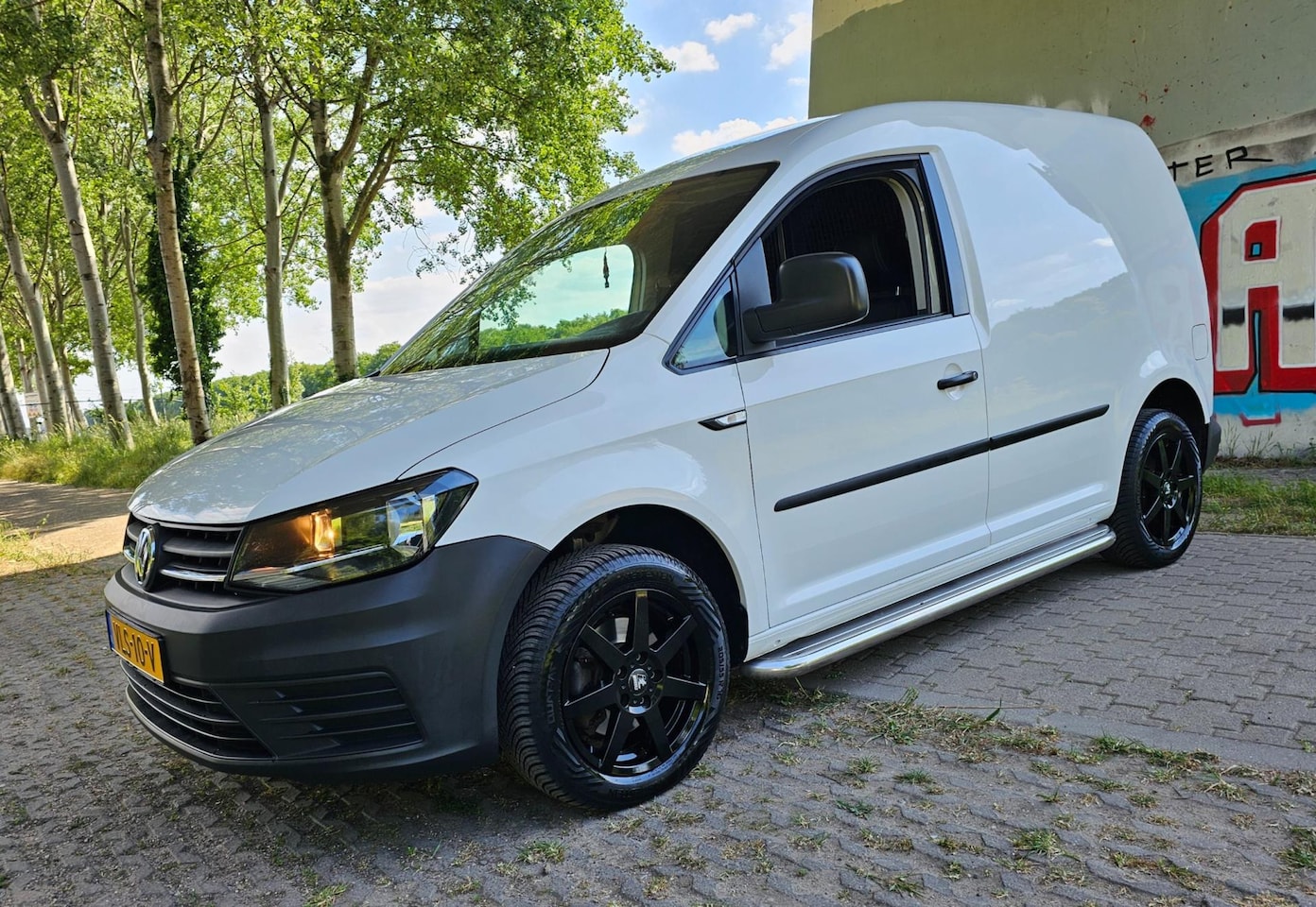 Volkswagen Caddy - 1.6 TDI Leder interieur Airco Navigatie - AutoWereld.nl