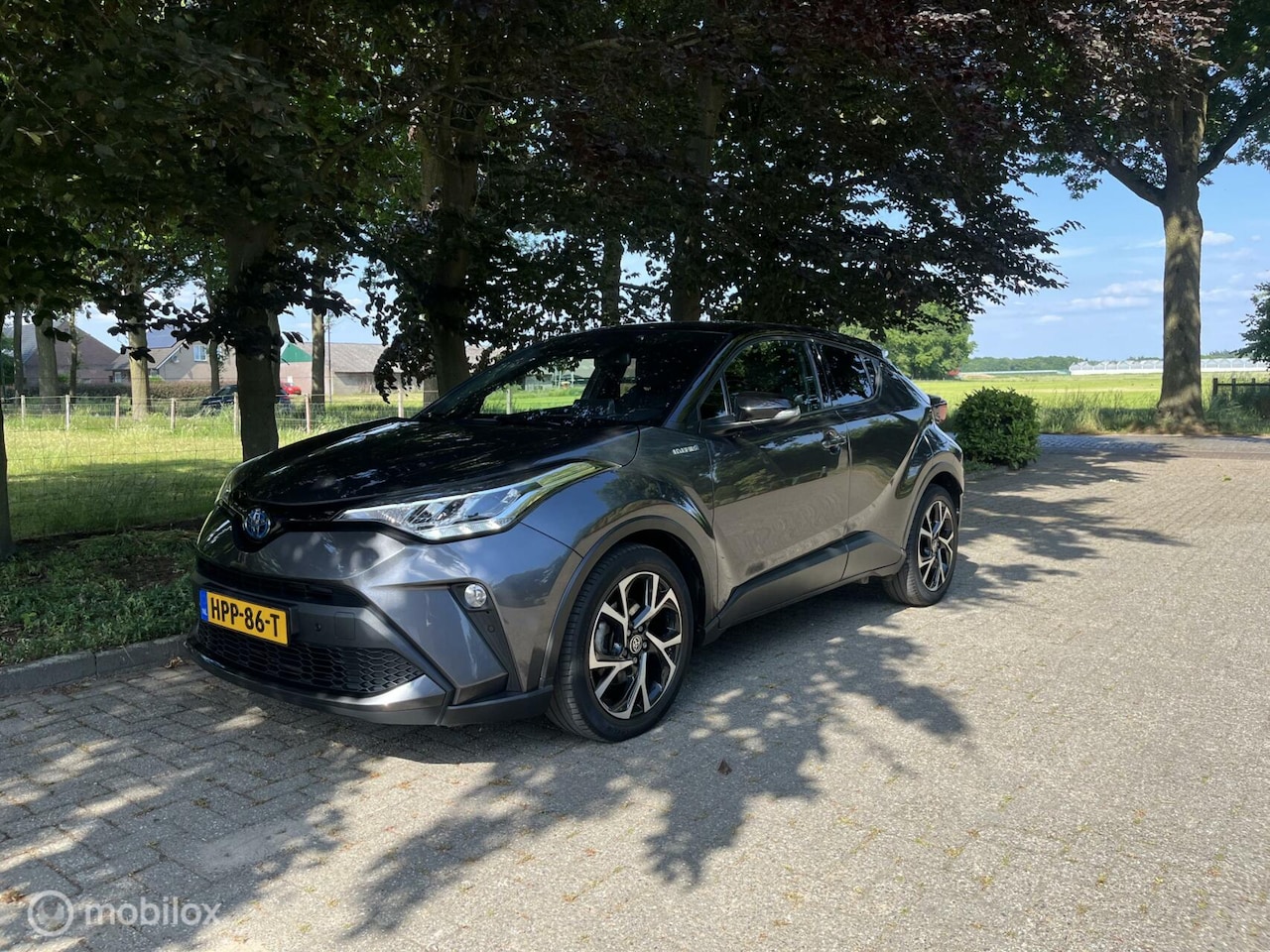 Toyota C-HR - 1.8 Hybrid Bi-Tone carplay pdc all in rijklaar - AutoWereld.nl