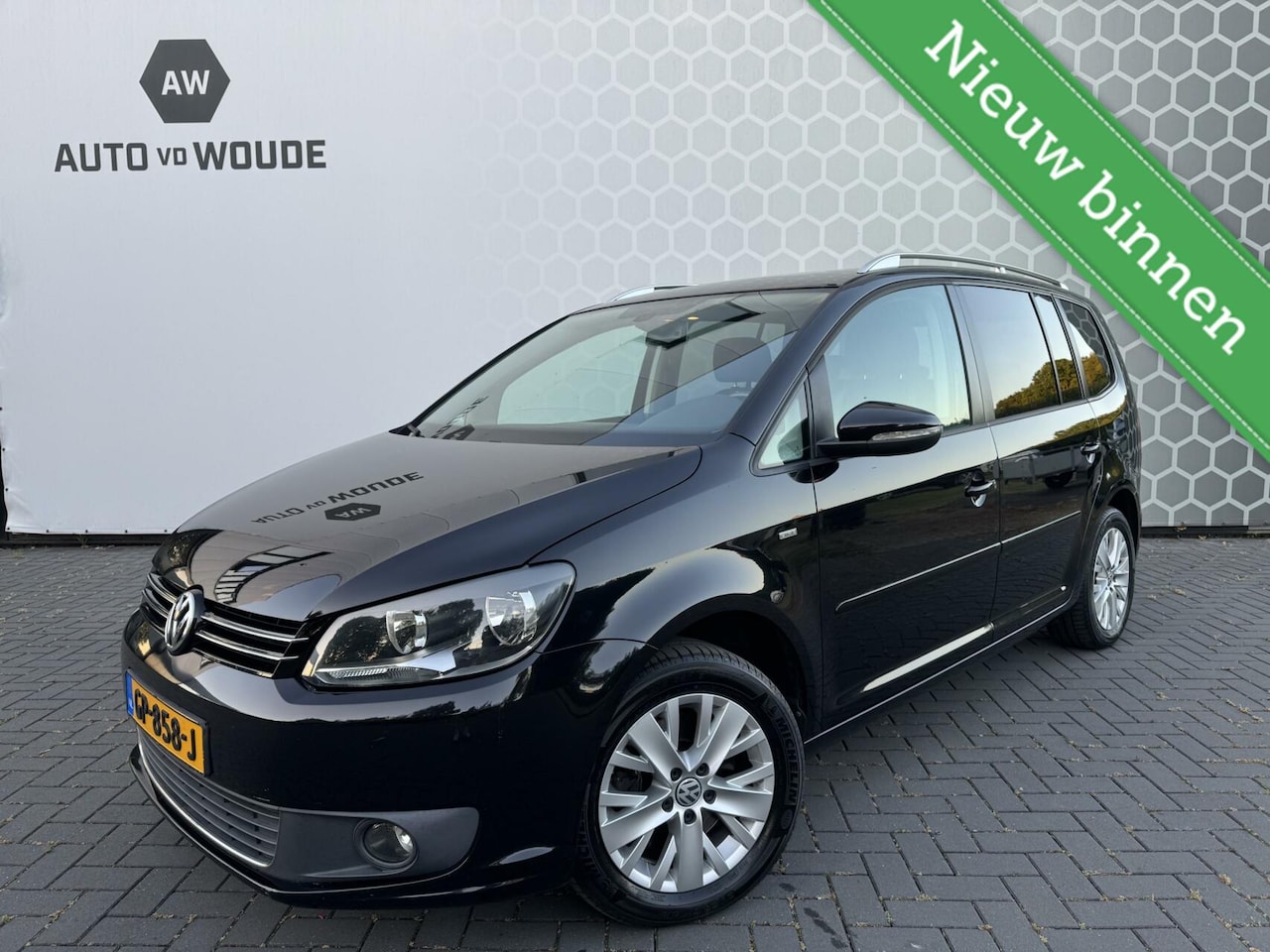 Volkswagen Touran - 2.0 TDI Highline BlueMotion Pano Trekhaak - AutoWereld.nl