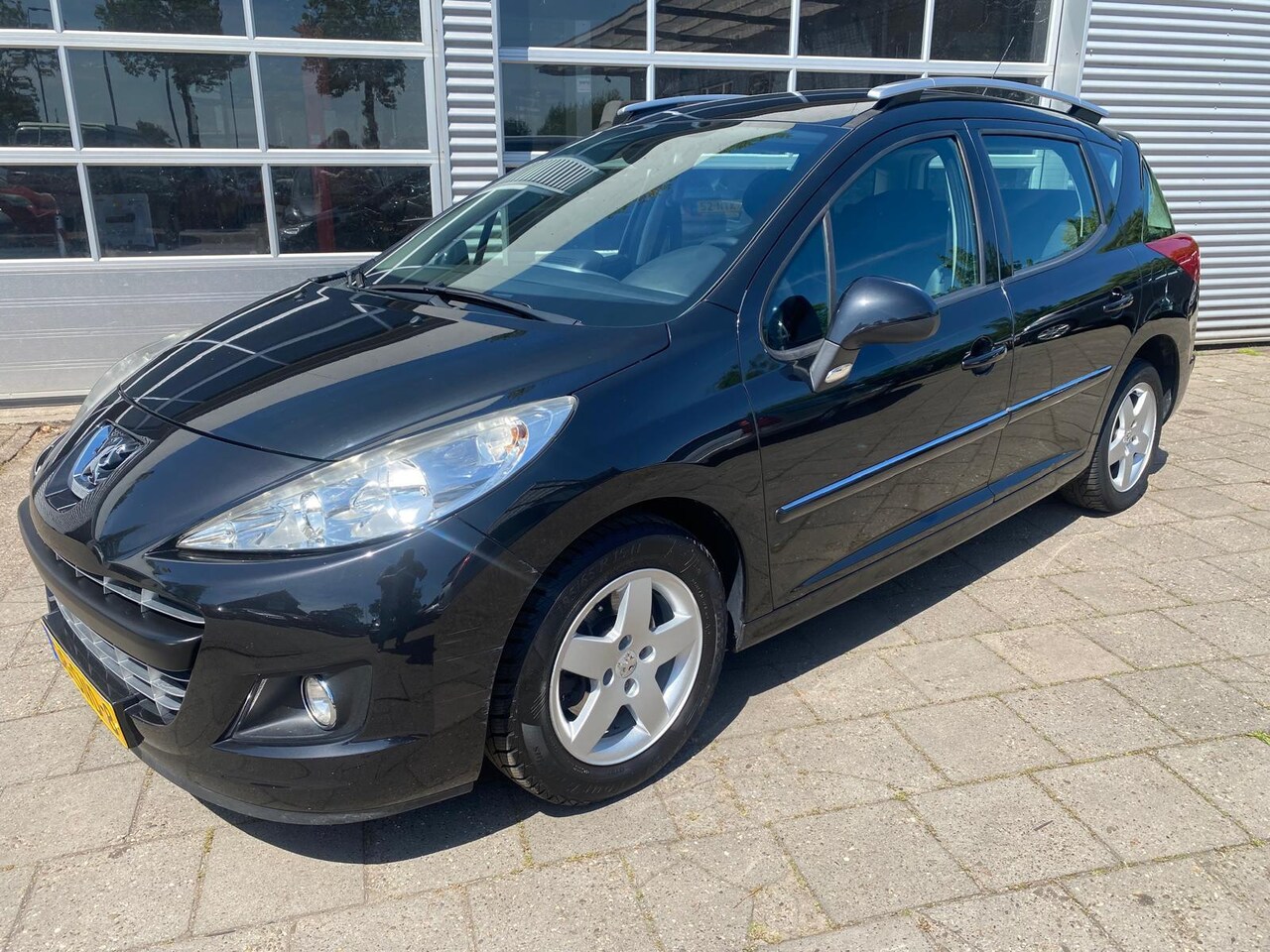Peugeot 207 SW - 1.4 VTi Blue Lease Executive - Airco - Cruise Control - AutoWereld.nl