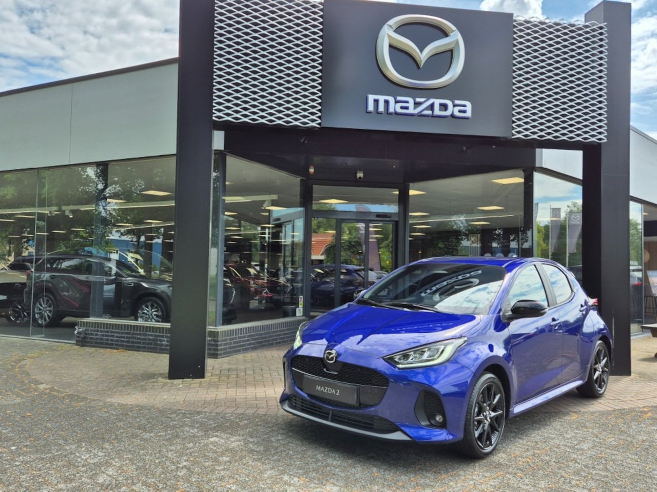 Mazda 2 Hybrid - MAZDA 2 HYBRID 116 HOMURA / €3050 INSTAP VOORDEEL - AutoWereld.nl