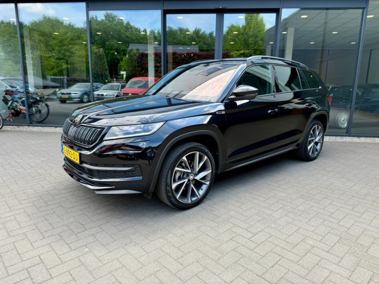 Skoda Kodiaq - 1.5 TSI SportLine 7-pers,Pano,Leer/Alcant,LED,Memory,Trekhk,Stoe - AutoWereld.nl