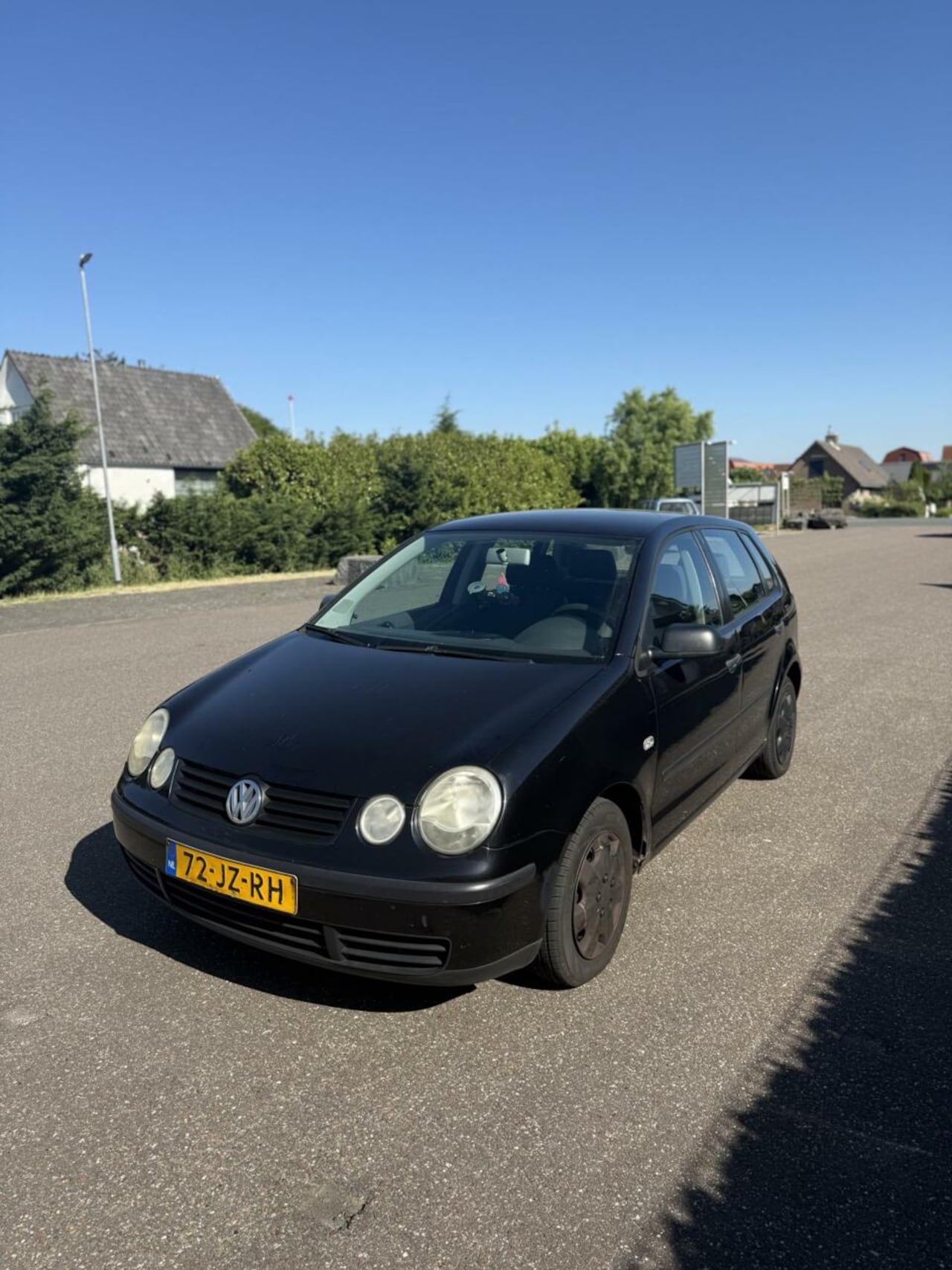 Volkswagen Polo - 1.2-12V Zwart 14 maanden APK Trekhaak - AutoWereld.nl