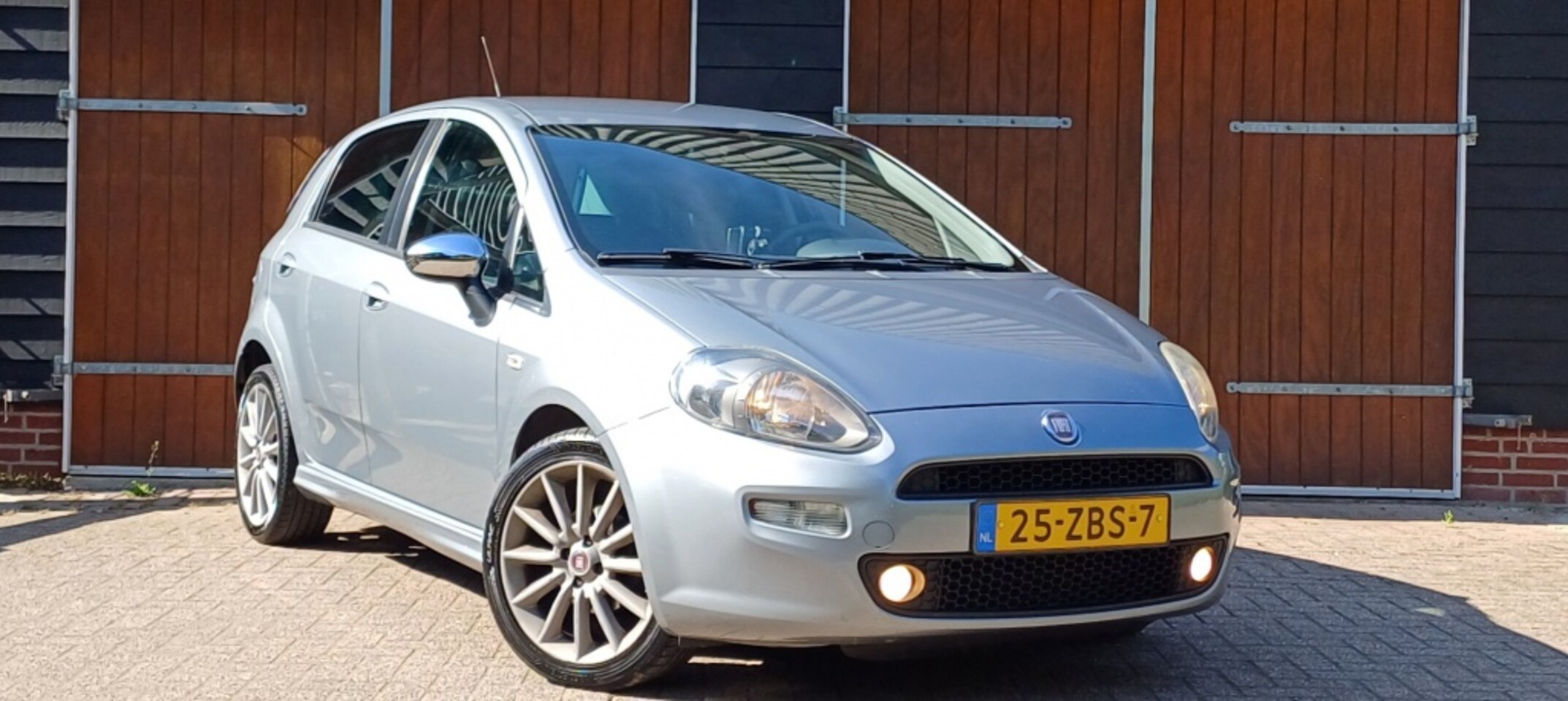 Fiat Punto Evo - 0.9 TwinAir Sport 0.9 TwinAir Sport, Airco, Bluetooth, Cruise controle - AutoWereld.nl