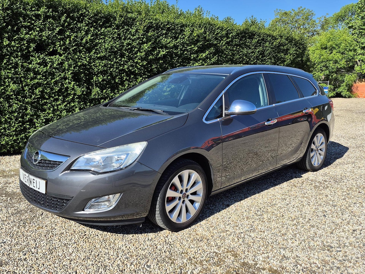 Opel Astra - 1.4 Turbo Cosmo | Navi | Clima | Stoel- / Stuurverwarming | Trekhaak | Cruise | Elek. Pakk - AutoWereld.nl