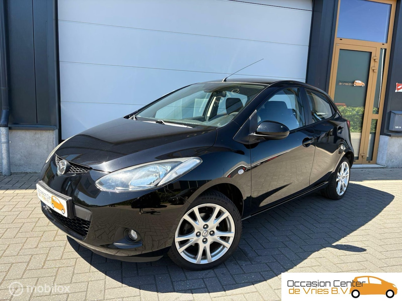 Mazda 2 - 1.3 Airco Velgen ElektrPakket Stoelverwarm Bluetooth - AutoWereld.nl