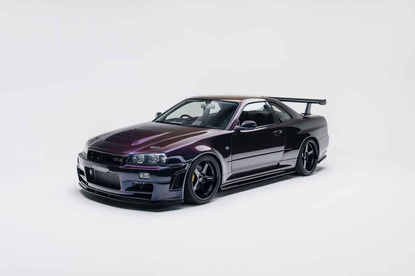 Nissan GT-R - Skyline R34 GTR V-spec Midnight Purple II - AutoWereld.nl