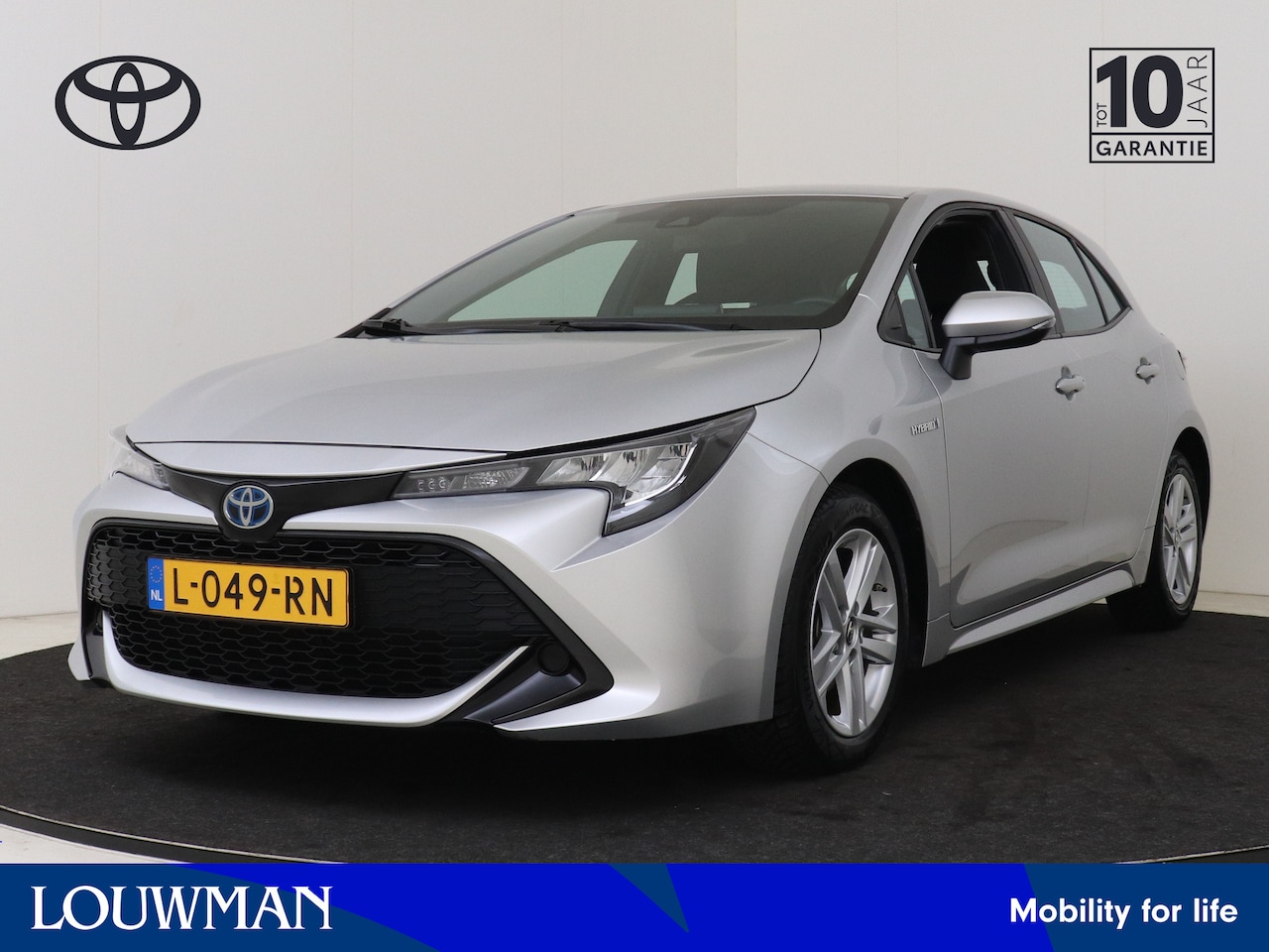 Toyota Corolla - 1.8 Hybrid Active I Apple Carplay/Android Auto I Climate Control I Cruise Control I Camera - AutoWereld.nl